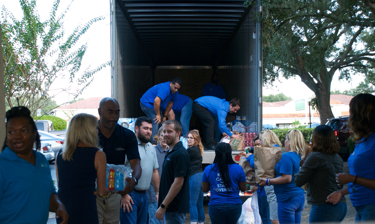 The supply truck being loaded by Health Insurance Innovations employees with supplies for victims of Hurricane Michael